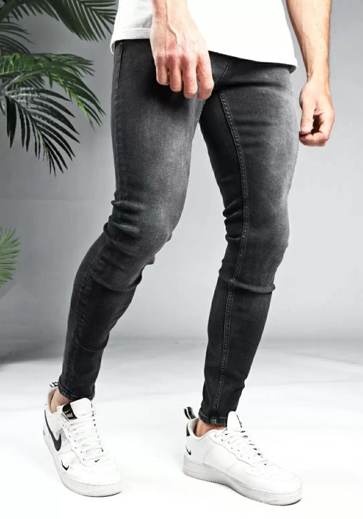 Rechter zijkant grijze denim heren jeans met skinny pasvorm, gemaakt van stretch stof.