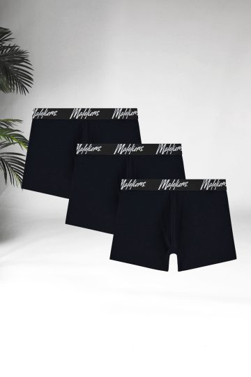Vooraanzicht van 3 zwarte boxers met het witte Malelions logo rondom de tailleband.