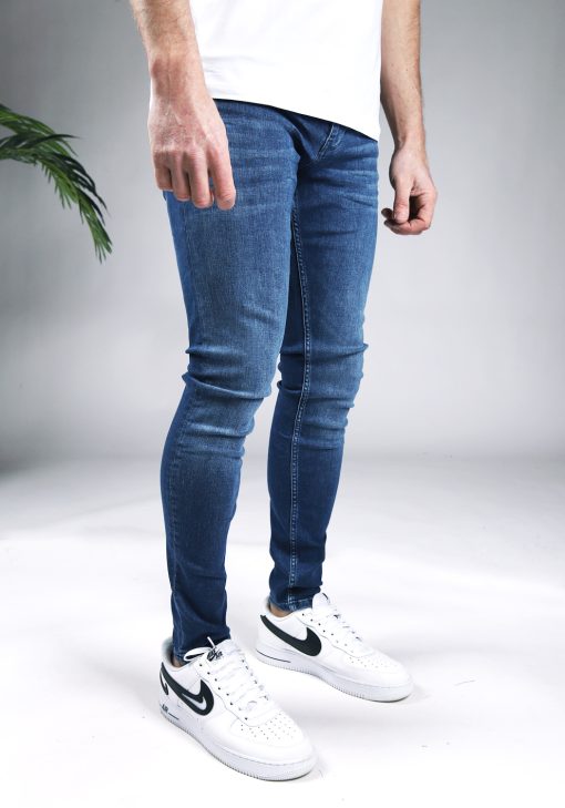 Rechter zijaanzicht Purewhite The Jone Jeans Mid Blue heren skinny jeans.
