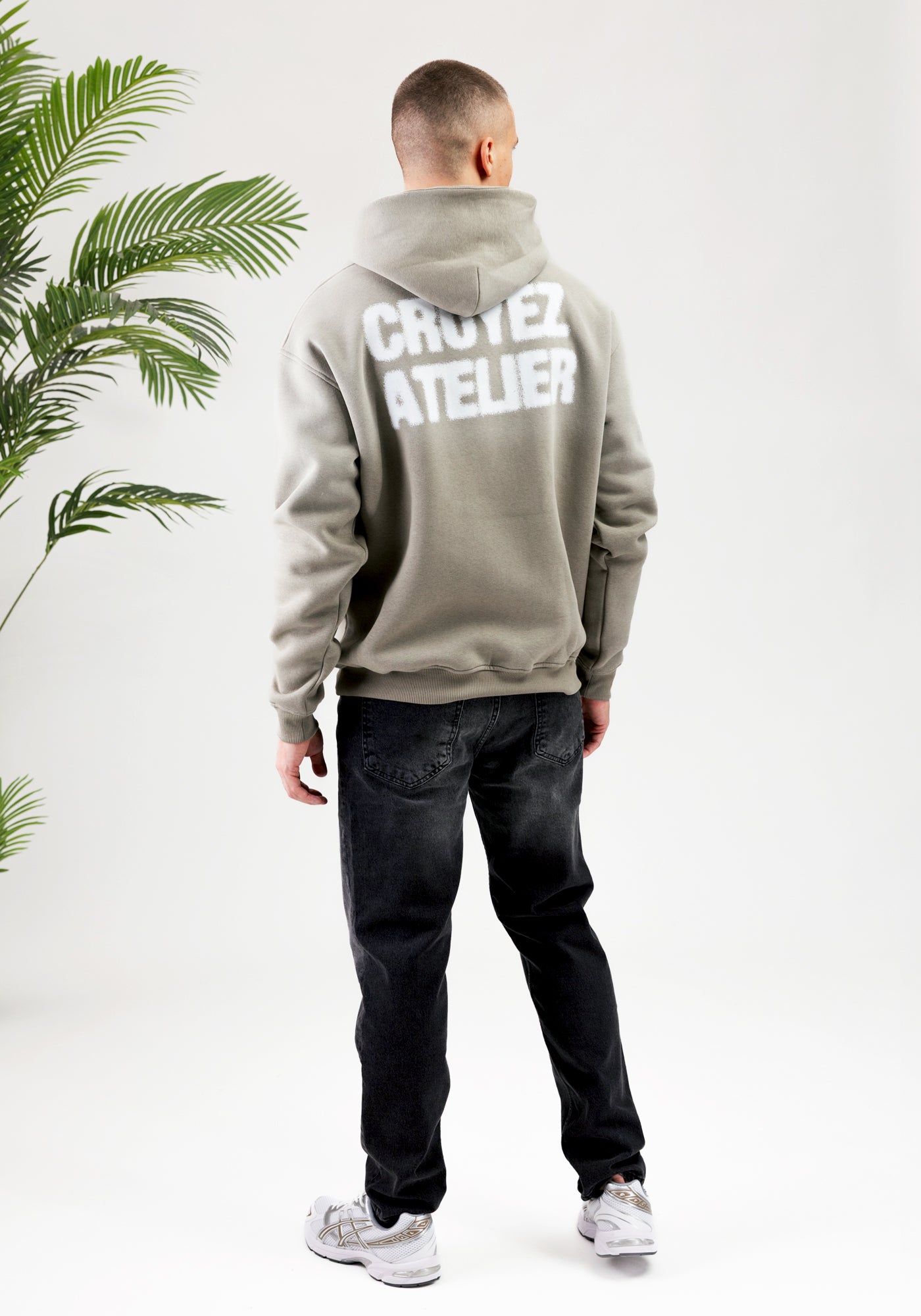 https://cdn.shopify.com/s/files/1/0935/6315/8909/files/CROYEZ_SPRAYED_ATELIER_HOODIE--CD1083-DUSTY_OLIVE-4.jpg?v=1771517401 Cotton District CROYEZ SPRAYED ATELIER HOODIE DUSTY OLIVE