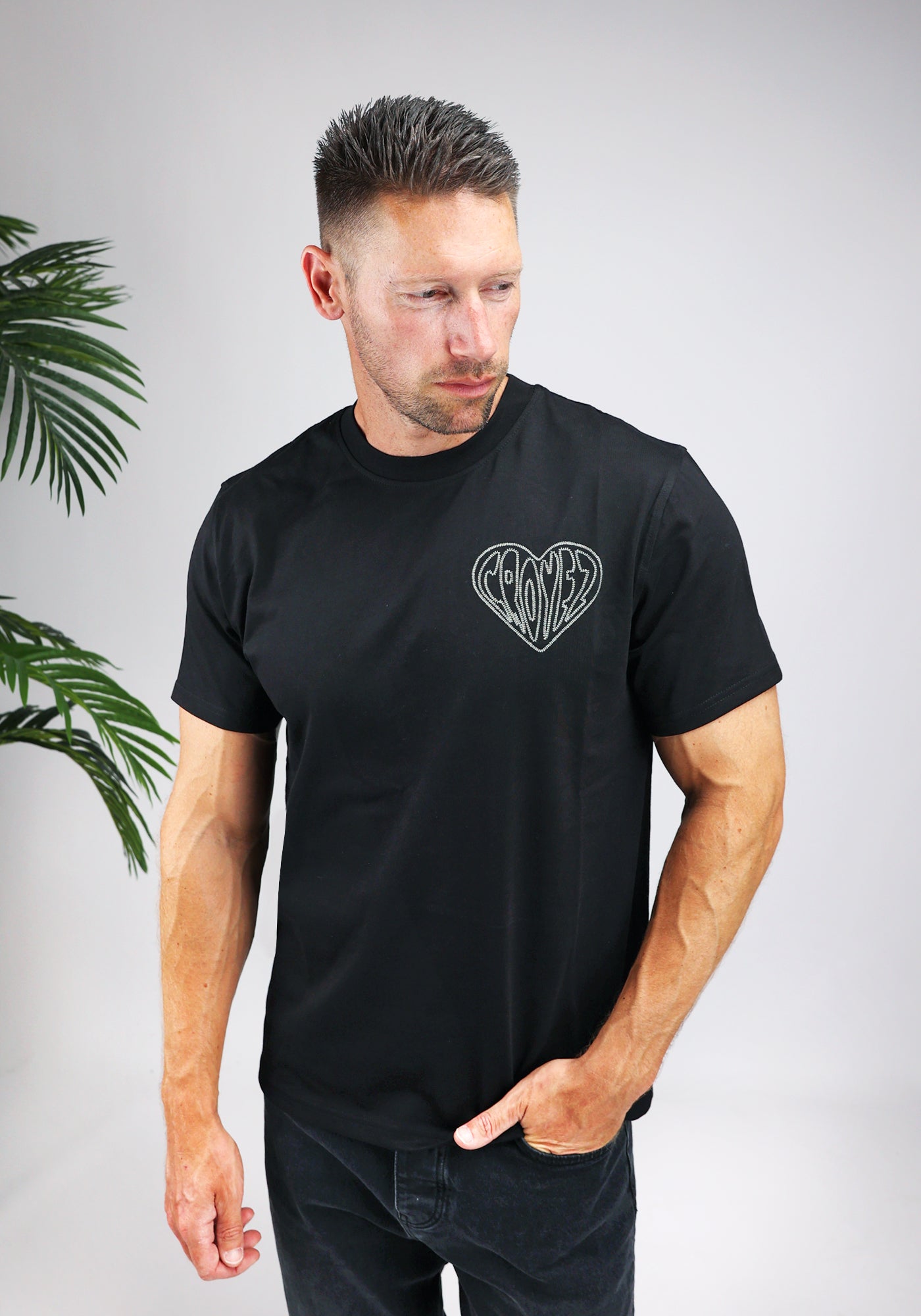 https://cdn.shopify.com/s/files/1/0935/6315/8909/files/CROYEZ_STITCHED_HEART_T-SHIRT--CD1044-BLACK-1.jpg?v=1771495291 Cotton District CROYEZ STITCHED HEART T-SHIRT BLACK