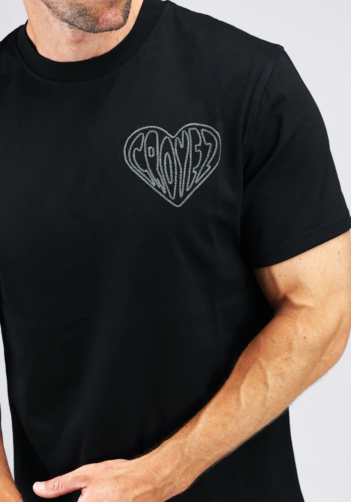 https://cdn.shopify.com/s/files/1/0935/6315/8909/files/CROYEZ_STITCHED_HEART_T-SHIRT--CD1044-BLACK-3.jpg?v=1771495291 Cotton District CROYEZ STITCHED HEART T-SHIRT BLACK