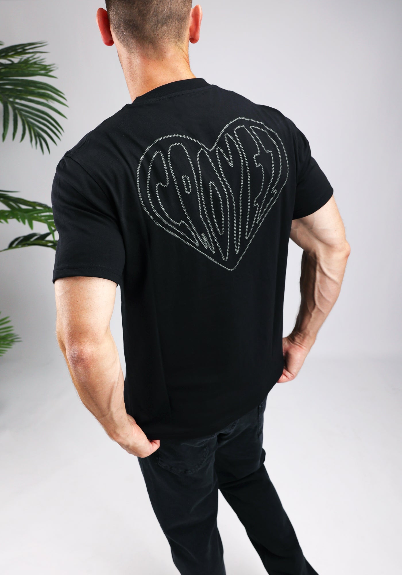 https://cdn.shopify.com/s/files/1/0935/6315/8909/files/CROYEZ_STITCHED_HEART_T-SHIRT--CD1044-BLACK.jpg?v=1771495291 Cotton District CROYEZ STITCHED HEART T-SHIRT BLACK