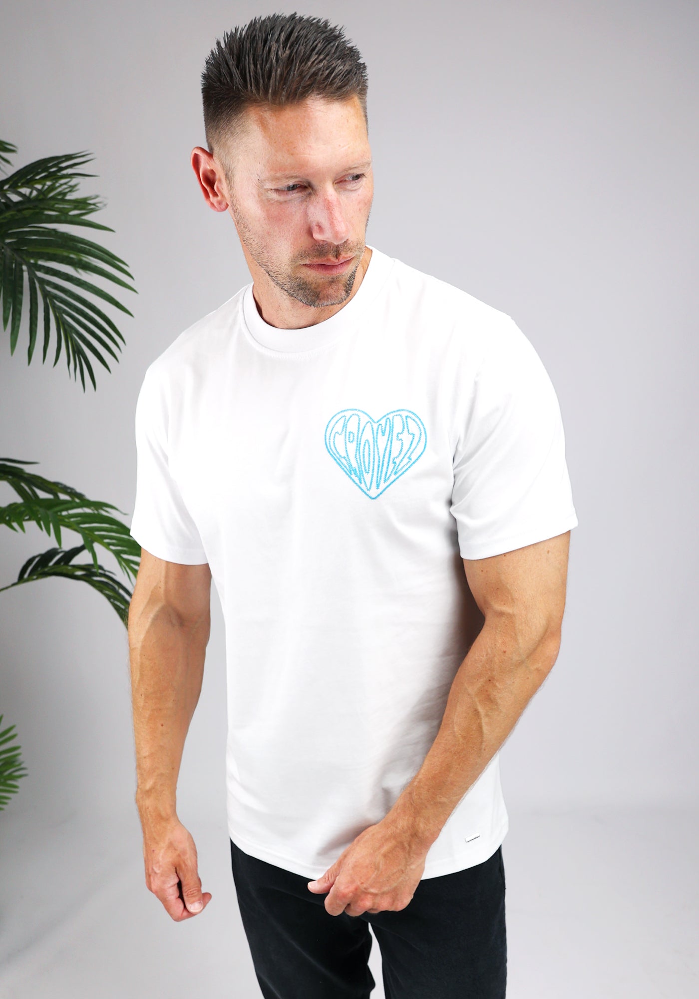 https://cdn.shopify.com/s/files/1/0935/6315/8909/files/CROYEZ_STITCHED_HEART_T-SHIRT--CD1044-WHITE-1.jpg?v=1771495305 Cotton District CROYEZ STITCHED HEART T-SHIRT WHITE