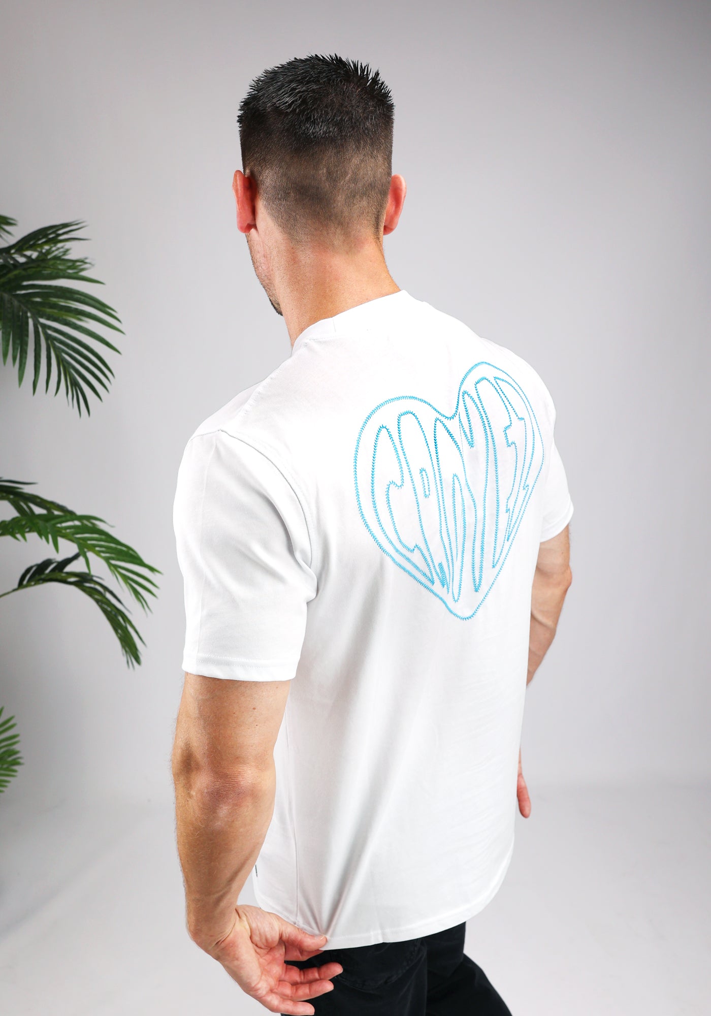 https://cdn.shopify.com/s/files/1/0935/6315/8909/files/CROYEZ_STITCHED_HEART_T-SHIRT--CD1044-WHITE-2.jpg?v=1771495306 Cotton District CROYEZ STITCHED HEART T-SHIRT WHITE