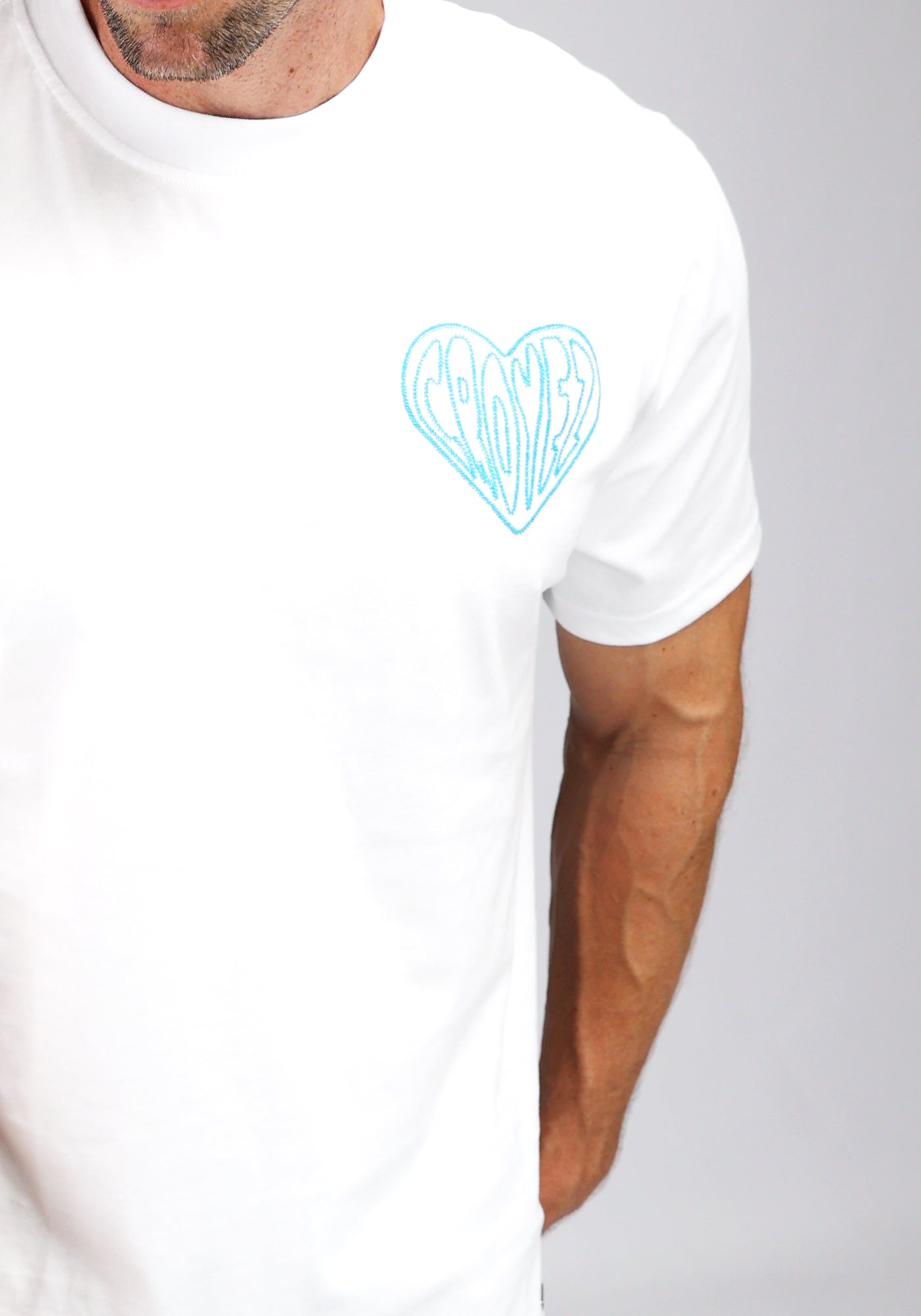https://cdn.shopify.com/s/files/1/0935/6315/8909/files/CROYEZ_STITCHED_HEART_T-SHIRT--CD1044-WHITE-3.jpg?v=1771495304 Cotton District CROYEZ STITCHED HEART T-SHIRT WHITE