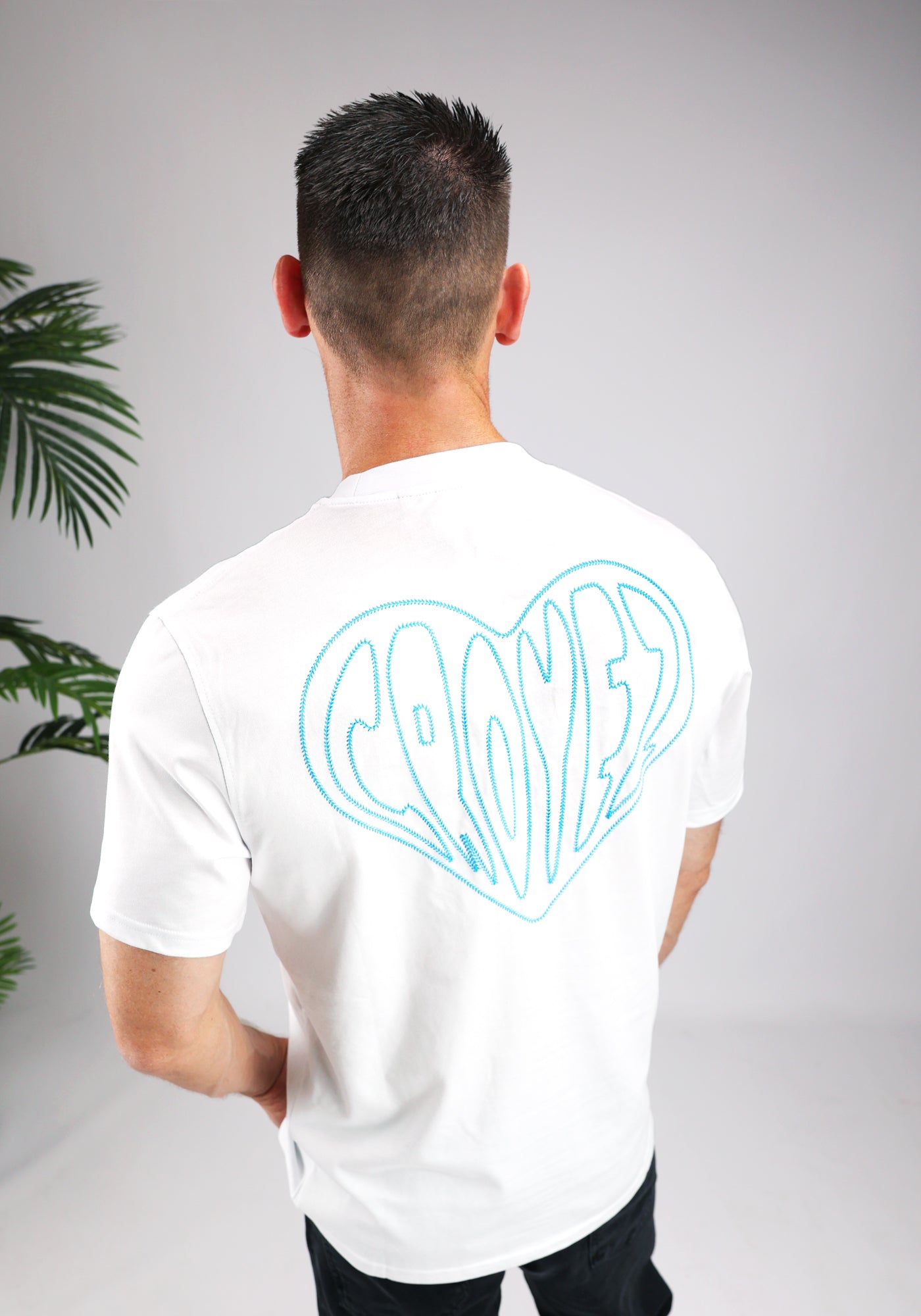 https://cdn.shopify.com/s/files/1/0935/6315/8909/files/CROYEZ_STITCHED_HEART_T-SHIRT--CD1044-WHITE.jpg?v=1771495305 Cotton District CROYEZ STITCHED HEART T-SHIRT WHITE