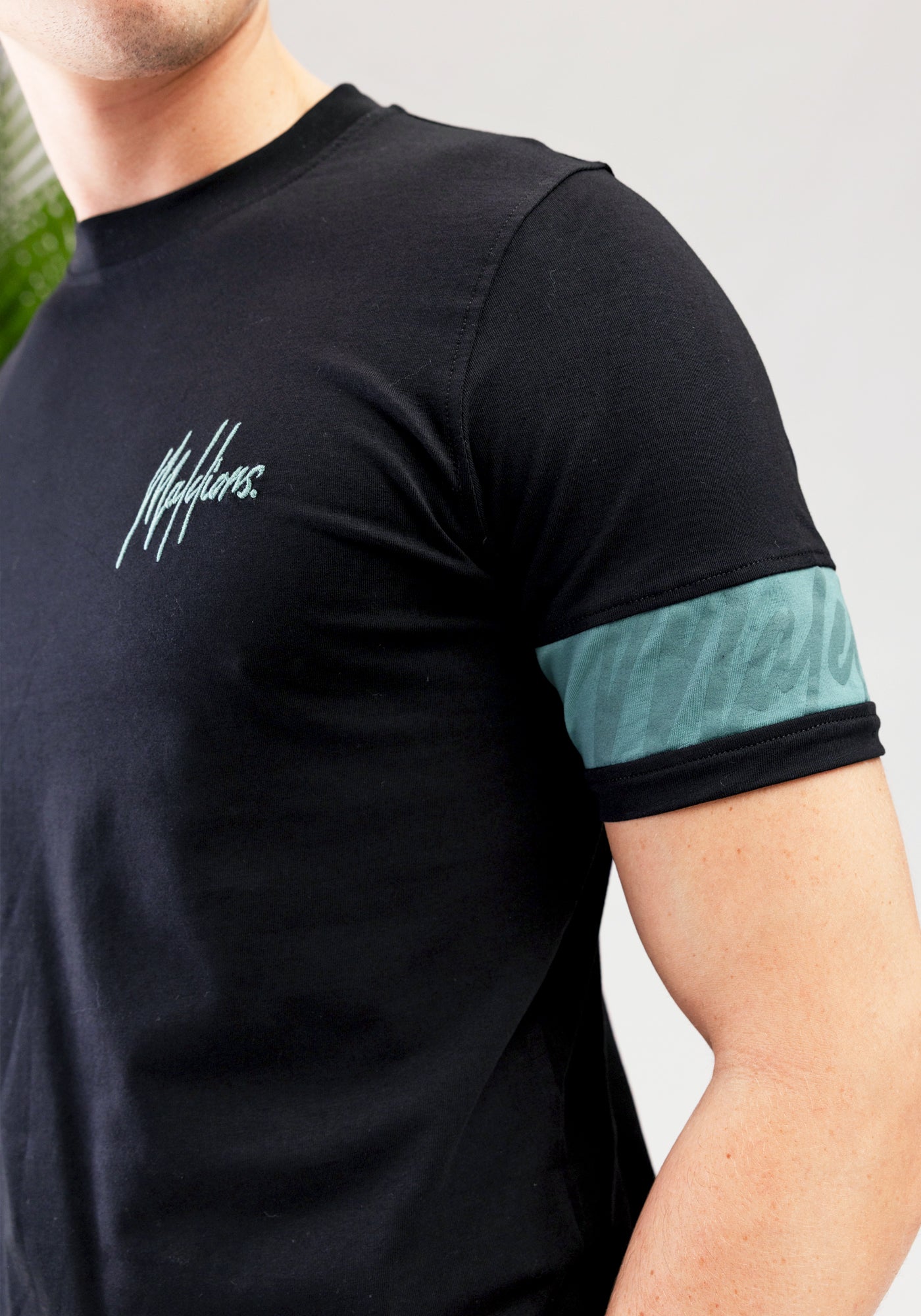 https://cdn.shopify.com/s/files/1/0935/6315/8909/files/MALELIONS_CAPTAIN_T-SHIRT--CD1059-BLACK-1.jpg?v=1771500698 Cotton District MALELIONS CAPTAIN T-SHIRT BLACK