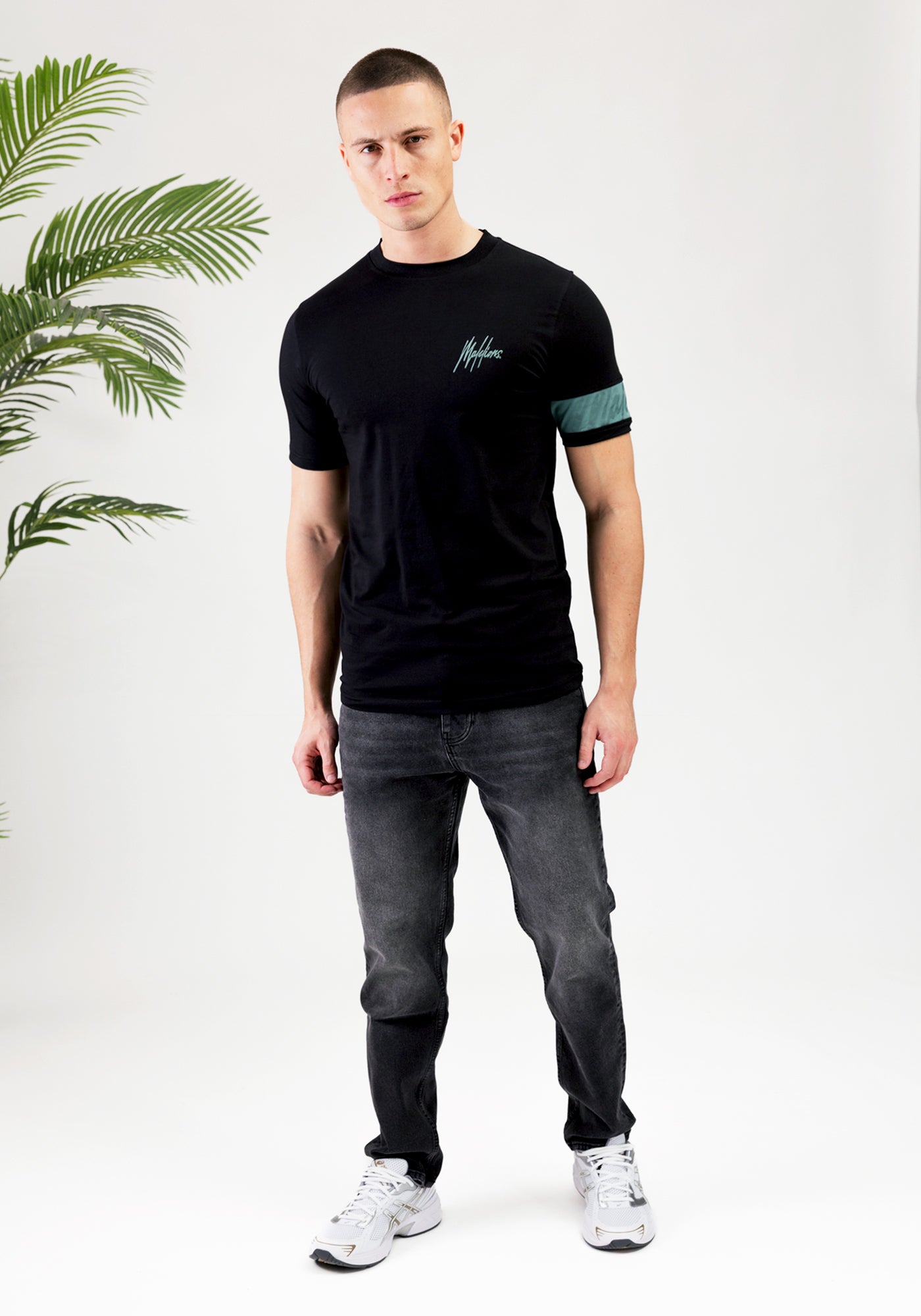 https://cdn.shopify.com/s/files/1/0935/6315/8909/files/MALELIONS_CAPTAIN_T-SHIRT--CD1059-BLACK-3.jpg?v=1771500698 Cotton District MALELIONS CAPTAIN T-SHIRT BLACK