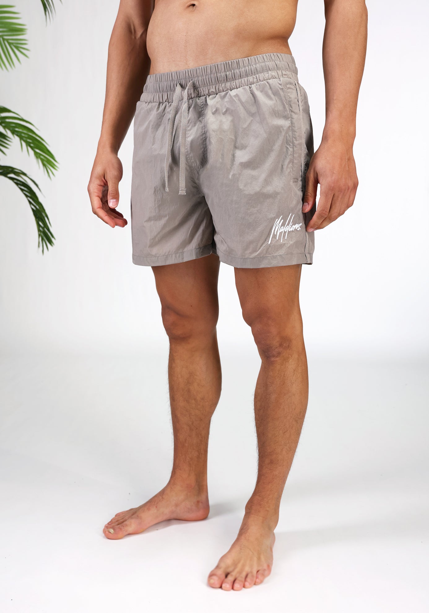https://cdn.shopify.com/s/files/1/0935/6315/8909/files/MALELIONS_CRINKLE_SWIMSHORTS--CD1121-TAUPE.jpg?v=1772105460 Cotton District MALELIONS CRINKLE SWIMSHORTS TAUPE
