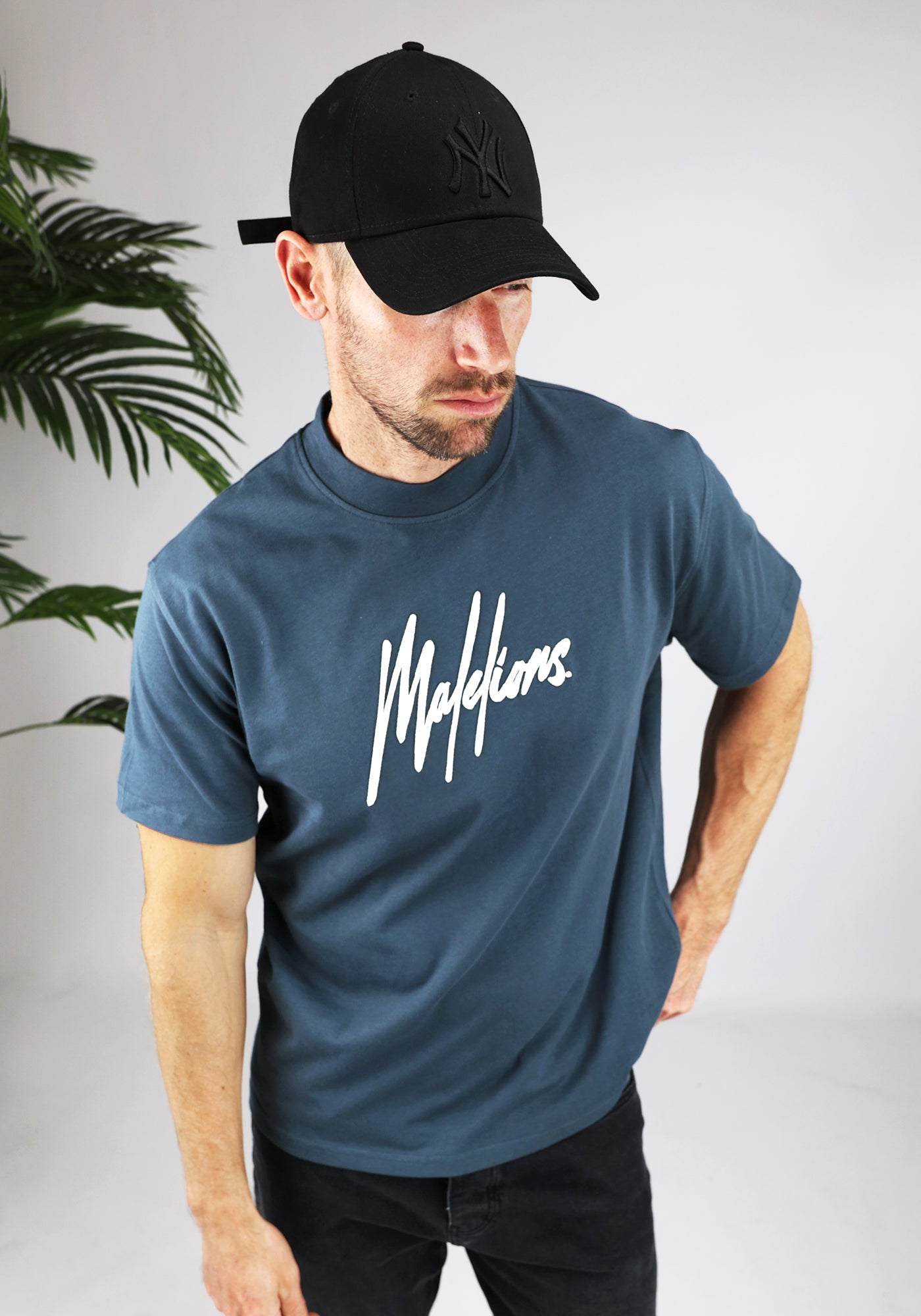 https://cdn.shopify.com/s/files/1/0935/6315/8909/files/MALELIONS_ESSENTIALS_T-SHIRT--CD1053-BLUE.jpg?v=1771498278 Cotton District MALELIONS ESSENTIALS T-SHIRT BLUE
