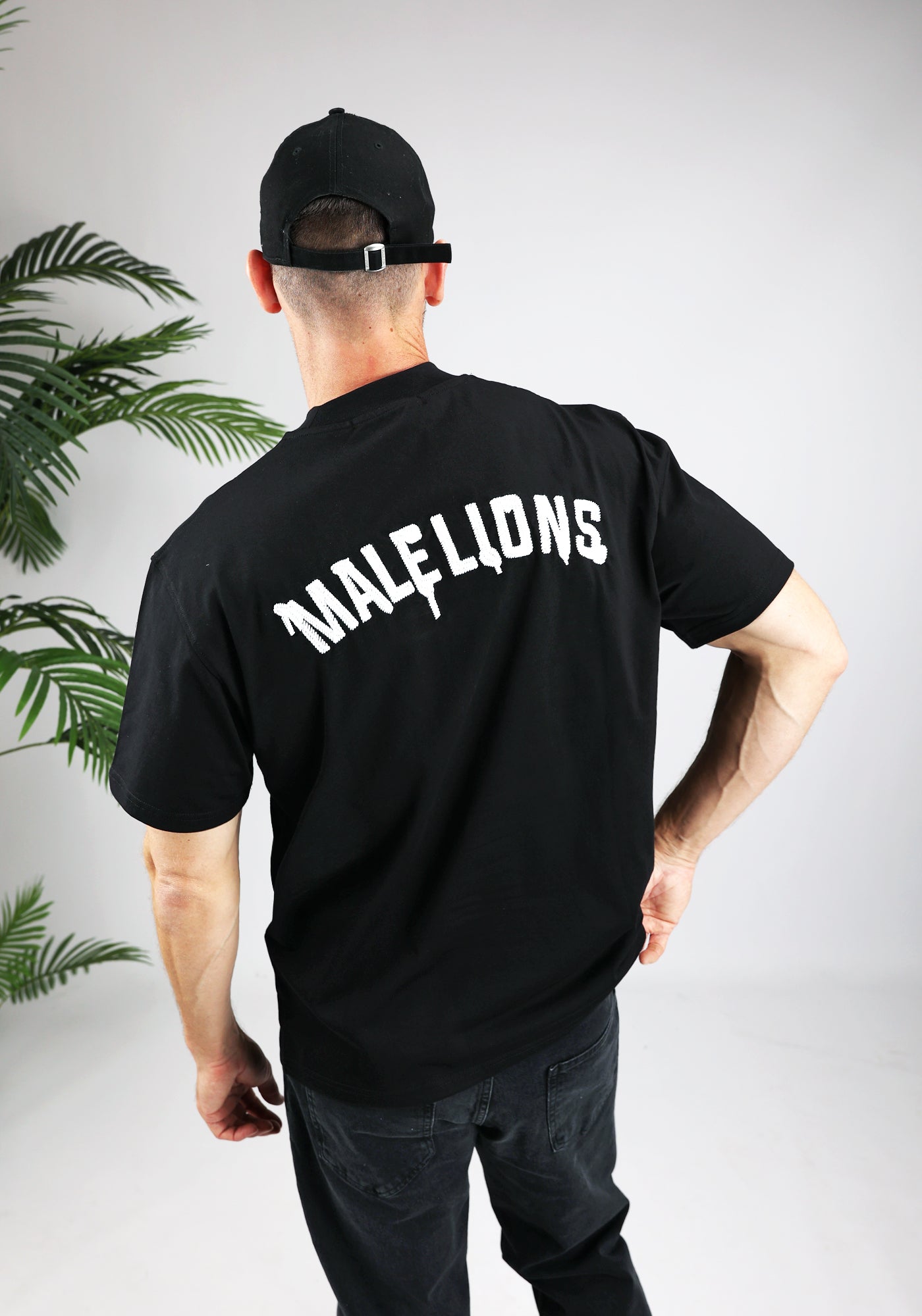 https://cdn.shopify.com/s/files/1/0935/6315/8909/files/MALELIONS_GRAFFITY_T-SHIRT--CD1050-BLACK-2.jpg?v=1771496360 Cotton District MALELIONS GRAFFITY T-SHIRT BLACK