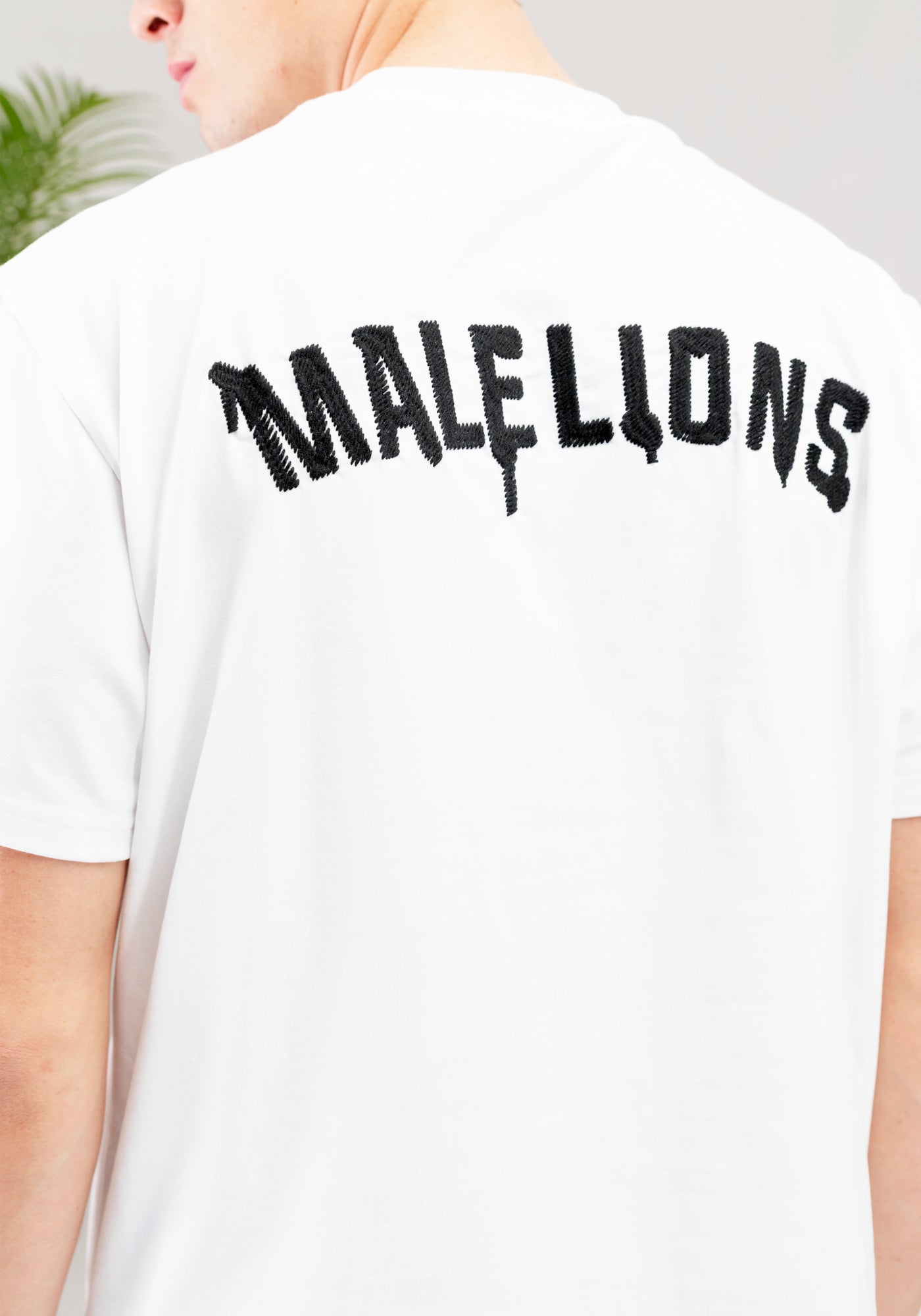 https://cdn.shopify.com/s/files/1/0935/6315/8909/files/MALELIONS_GRAFFITY_T-SHIRT--CD1050-WHITE-1.jpg?v=1771496377 Cotton District MALELIONS GRAFFITY T-SHIRT WHITE