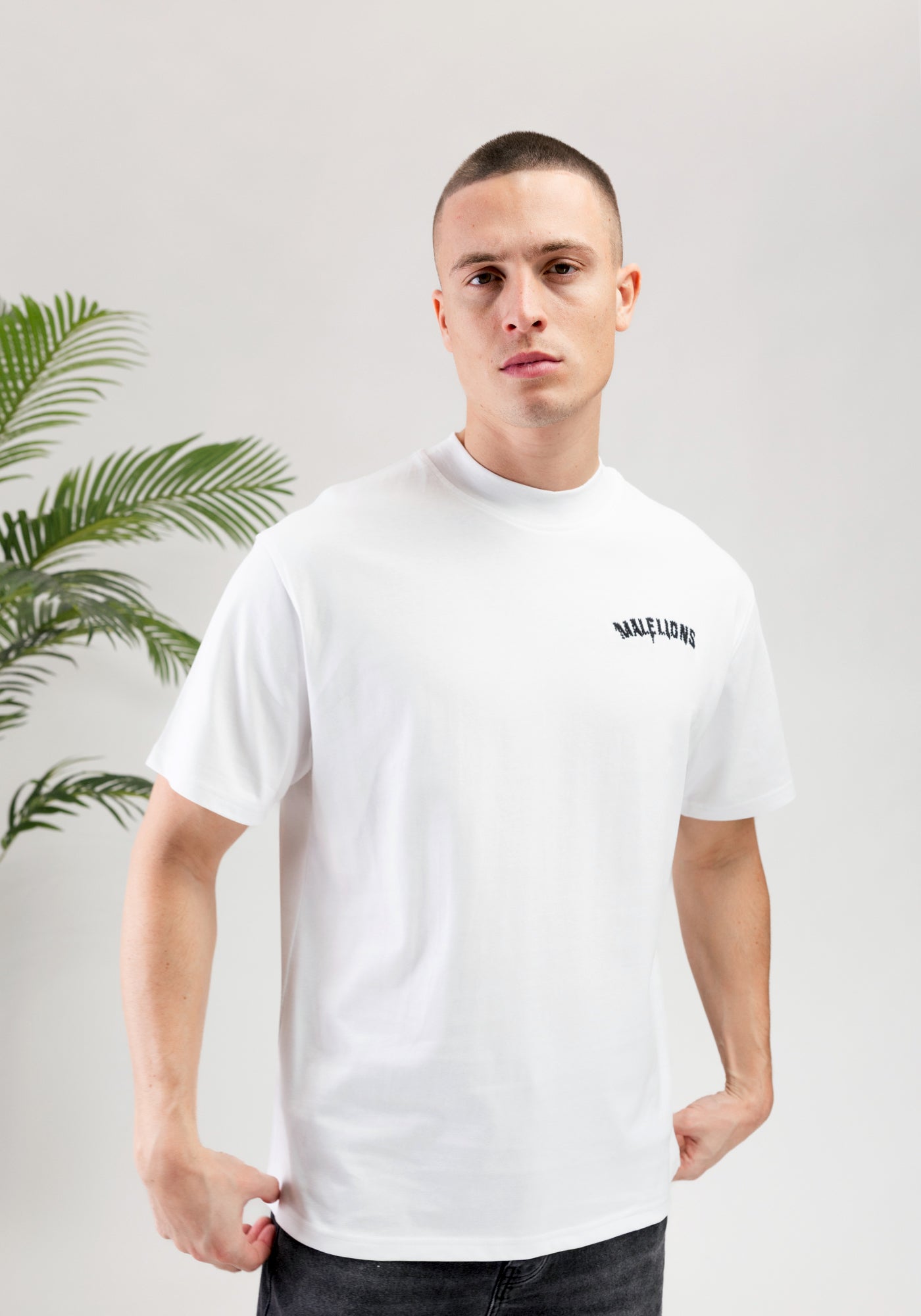 https://cdn.shopify.com/s/files/1/0935/6315/8909/files/MALELIONS_GRAFFITY_T-SHIRT--CD1050-WHITE-4.jpg?v=1771496378 Cotton District MALELIONS GRAFFITY T-SHIRT WHITE