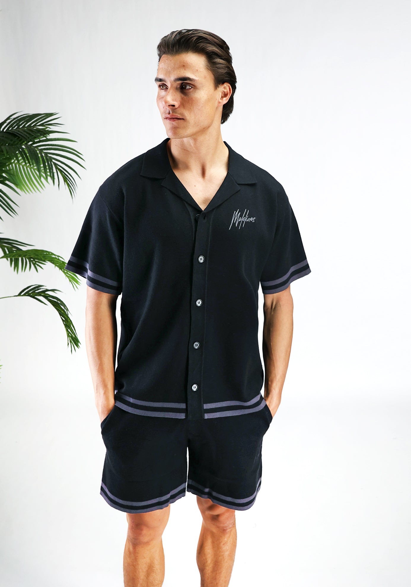 https://cdn.shopify.com/s/files/1/0935/6315/8909/files/MALELIONS_KNITTED_SET--CD1122-BLACK-1.jpg?v=1772105600 Cotton District MALELIONS KNITTED SET BLACK