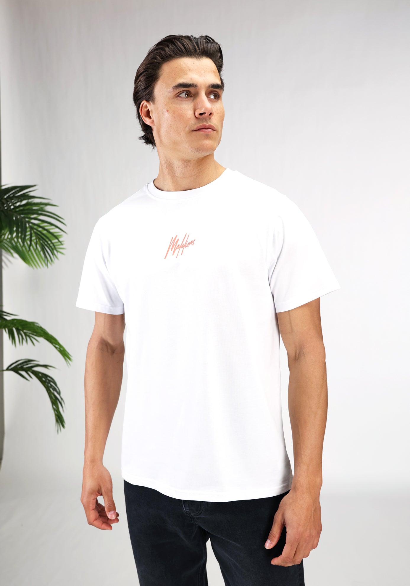 https://cdn.shopify.com/s/files/1/0935/6315/8909/files/MALELIONS_RETREAT_T-SHIRT--CD1062-WHITE-1.jpg?v=1771503862 Cotton District MALELIONS RETREAT T-SHIRT WHITE