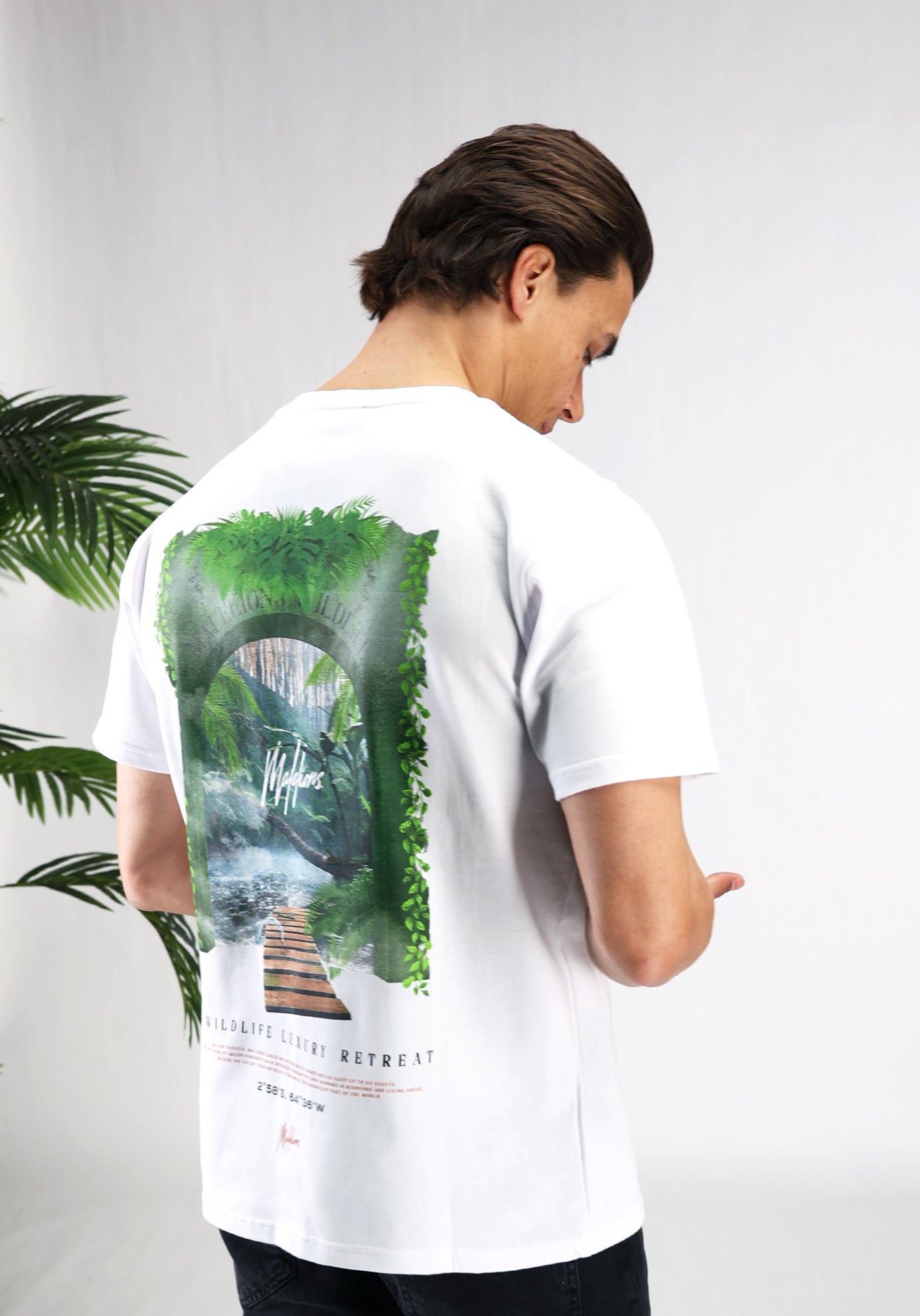 https://cdn.shopify.com/s/files/1/0935/6315/8909/files/MALELIONS_RETREAT_T-SHIRT--CD1062-WHITE.jpg?v=1771503862 Cotton District MALELIONS RETREAT T-SHIRT WHITE