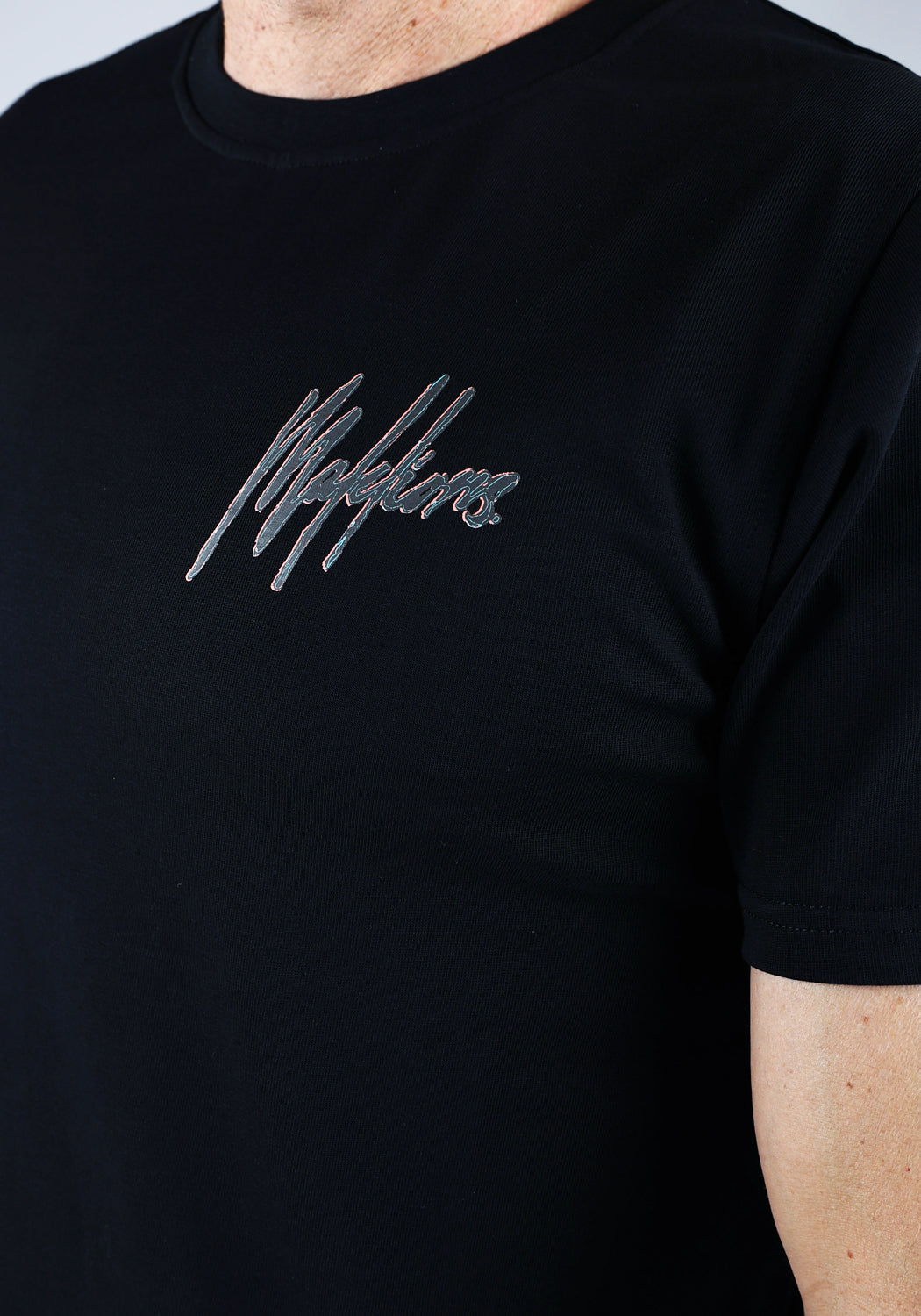 https://cdn.shopify.com/s/files/1/0935/6315/8909/files/MALELIONS_SIGNATURE_SKETCH_T-SHIRT--CD1057-BLACK-2.jpg?v=1771500162 Cotton District MALELIONS SIGNATURE SKETCH T-SHIRT BLACK
