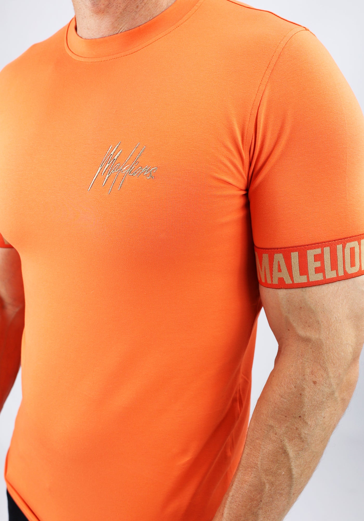 https://cdn.shopify.com/s/files/1/0935/6315/8909/files/MALELIONS_VENETIAN_T-SHIRT--CD1056-CORAL-2.jpg?v=1771499231 Cotton District MALELIONS VENETIAN T-SHIRT CORAL