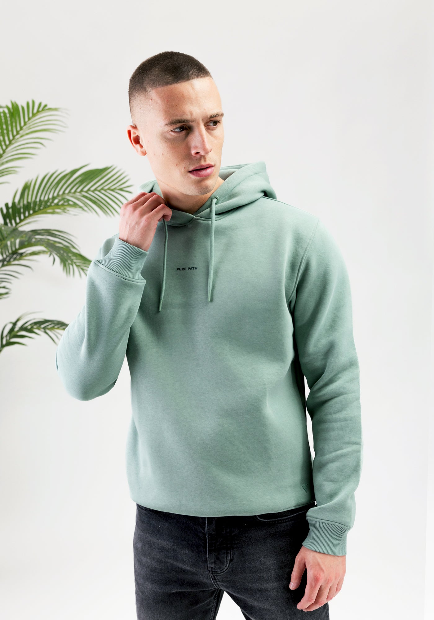 https://cdn.shopify.com/s/files/1/0935/6315/8909/files/PURE_PATH_ESSENTIAL_HOODIE--CD1095-ARMY_GREEN-4.jpg?v=1771524486 Cotton District PURE PATH ESSENTIAL HOODIE ARMY GREEN