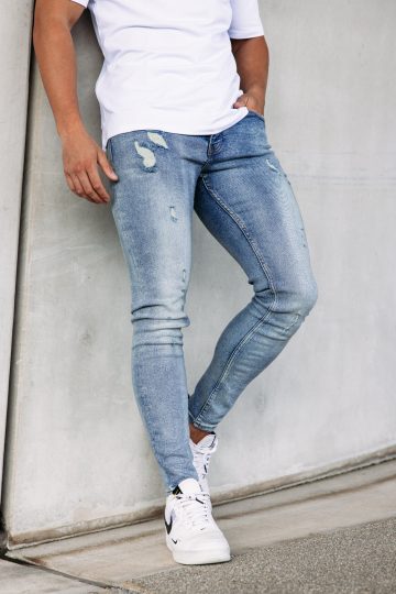 Cotton District TAPERED FIT JEANS MID BLUE RIPPED